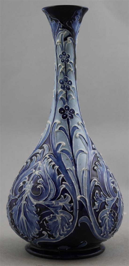 A Macintyre Moorcroft Florian Ware Iris pattern bottle vase, c.1900, 24.5cm